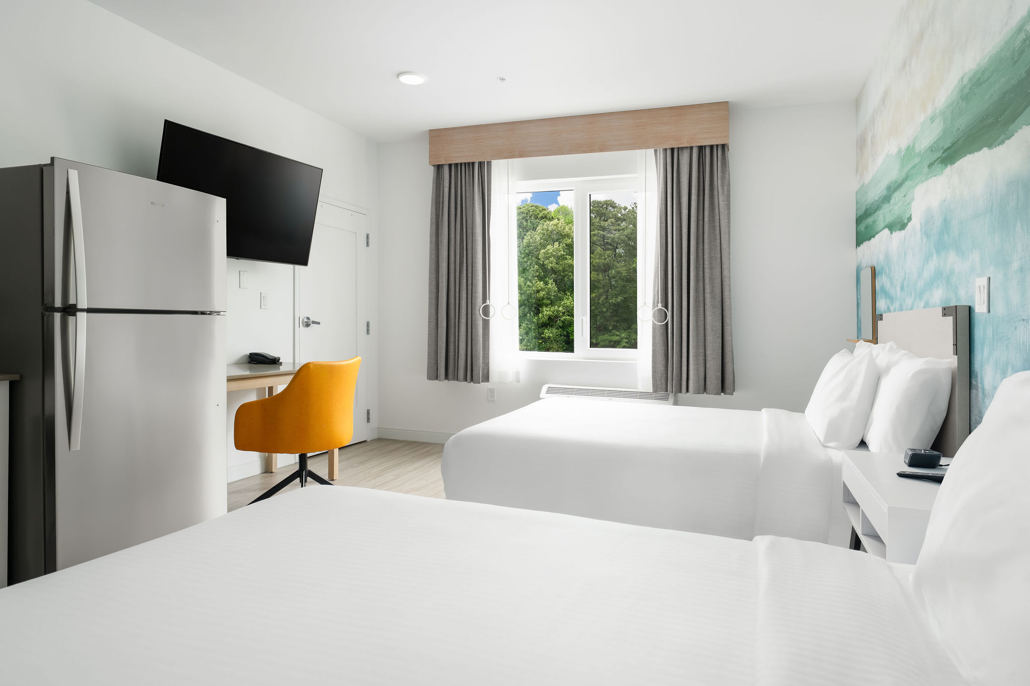 Double Queen ADA room with full kitchen and in-suite laundry
