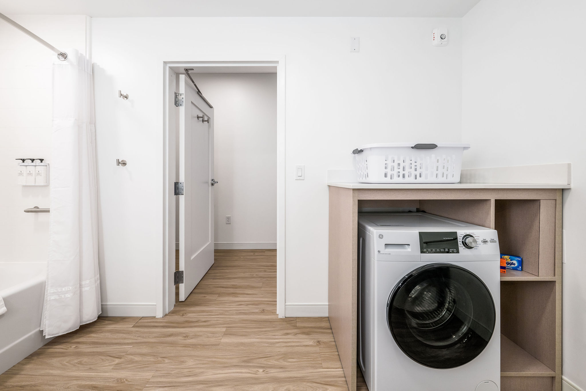 ADA Bathroom with in-suite laundry