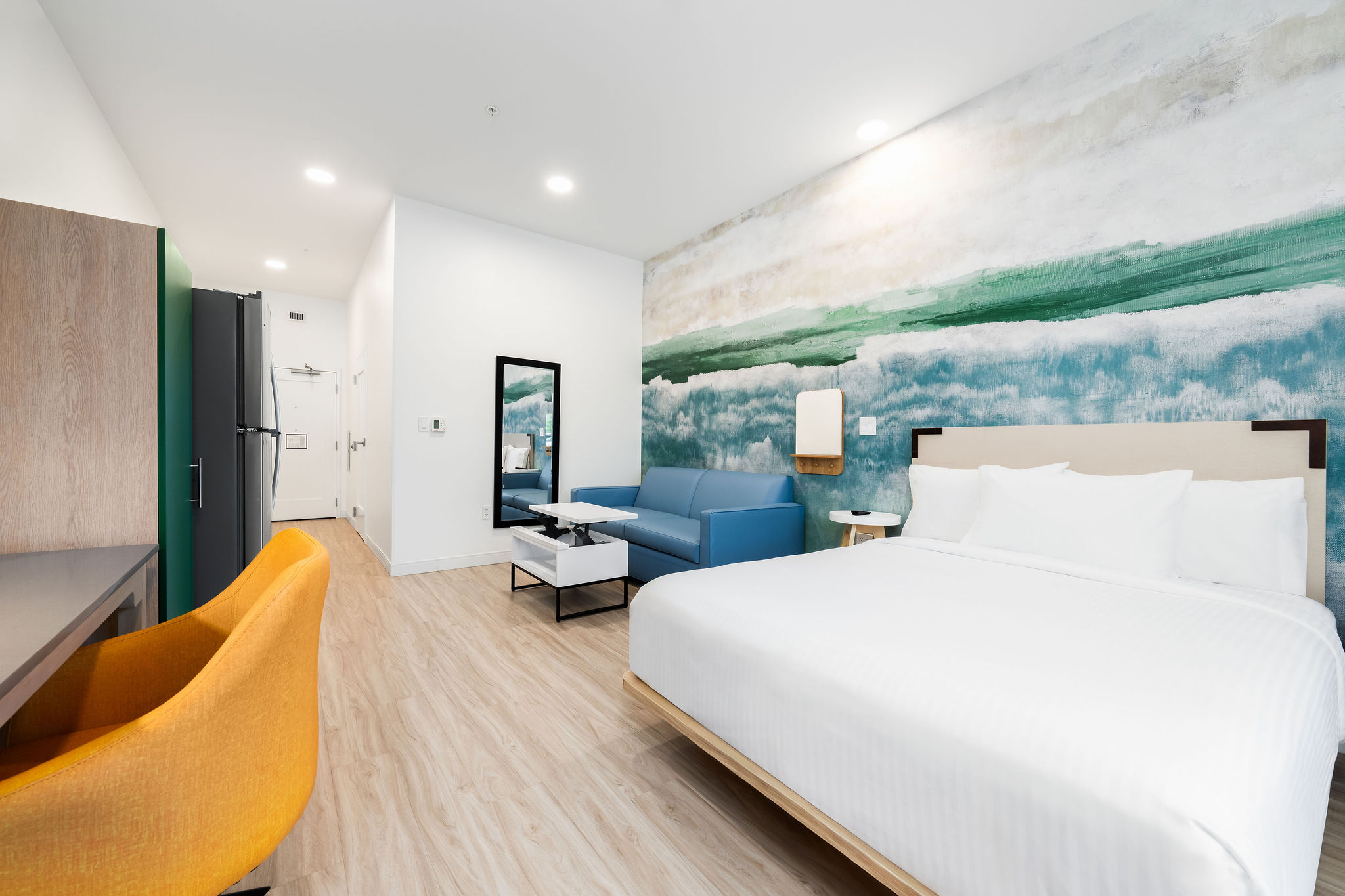 Standard Queen ADA room with one queen bed and fully equipped kitchen
