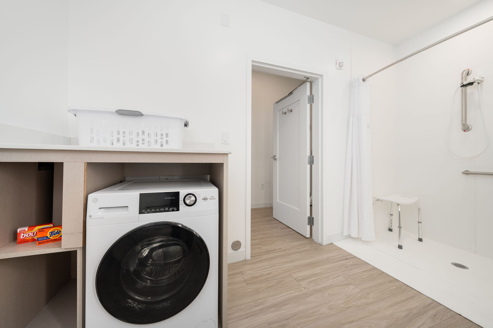 Standard Queen ADA room with in-suite laundry