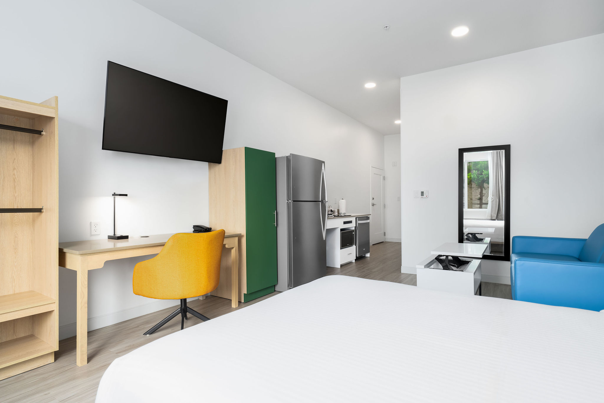 Standard Queen room with a full kitchen and sleeper sofa