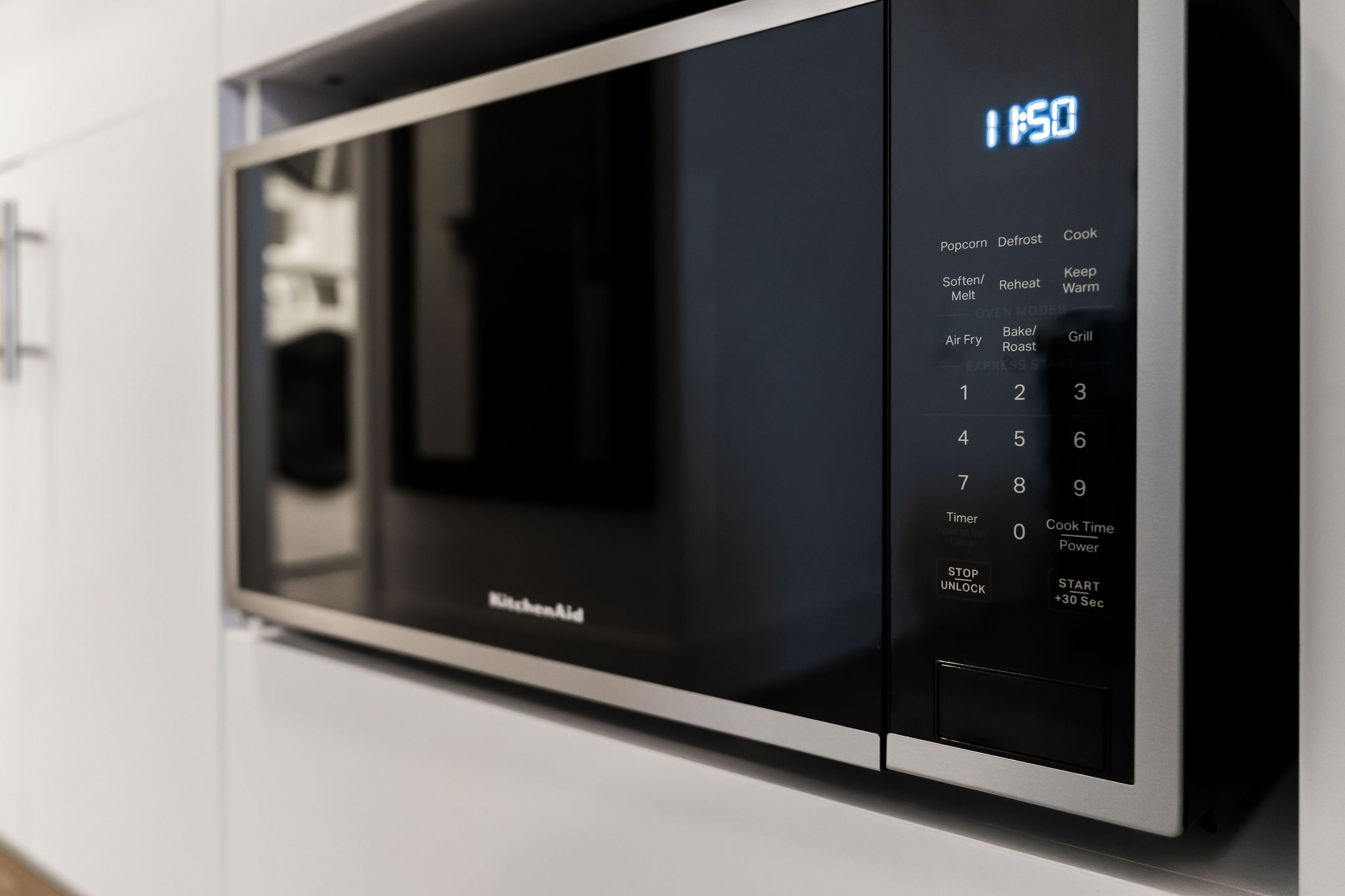 Standard Queen room with a full kitchen and combo air fryer/microwave/oven